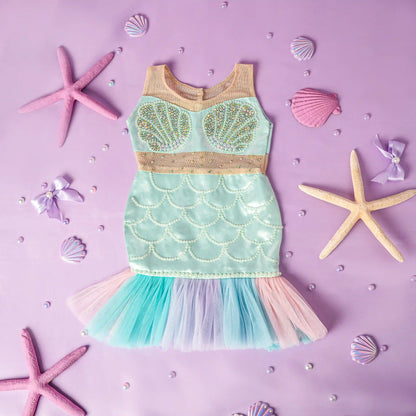 Mermaid-themed dress with starfish and shells on a purple background