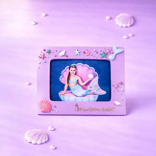 Mermaid-themed photo frame with a mermaid illustration on a purple background