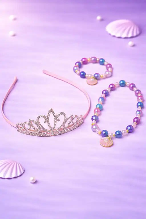 Children's tiara and pearl accessories on a purple background with seashells.