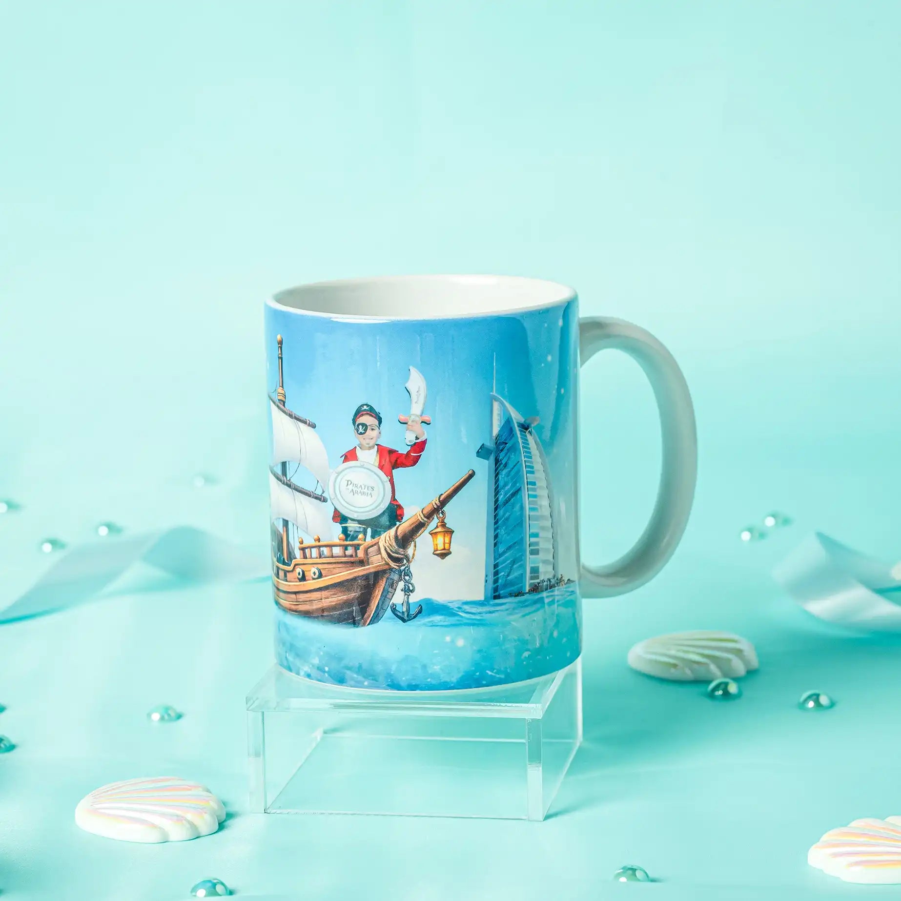 Mug with a design of a character on a boat against a blue background
