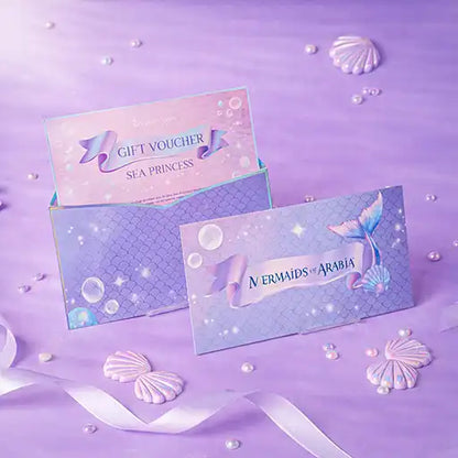 Gift voucher with mermaid design on a purple background